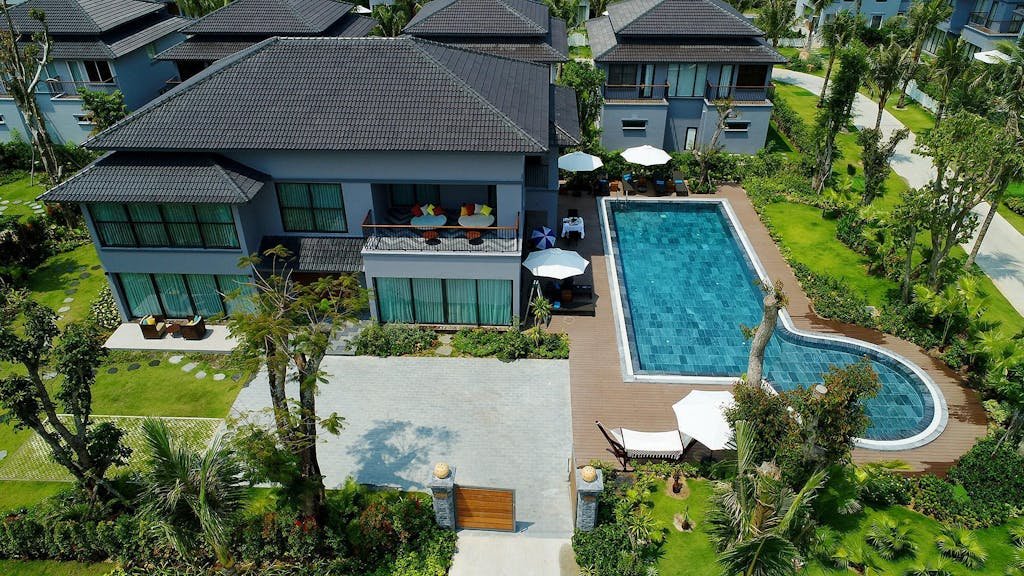 A luxurious villa with a modern swimming pool in Đắk Ya, Gia Lai, Vietnam.